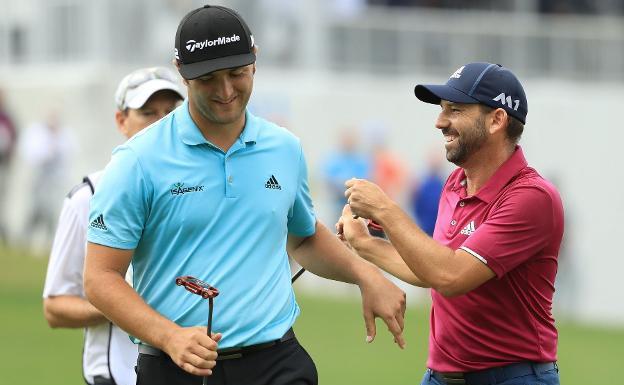 Jon Rahm (i) y Sergio García. 