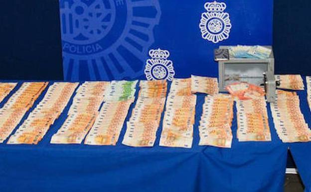 Parte del dinero recuperado por la Policía Nacional.