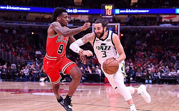 Ricky Rubio (d) y Antonio Blakeney (i).
