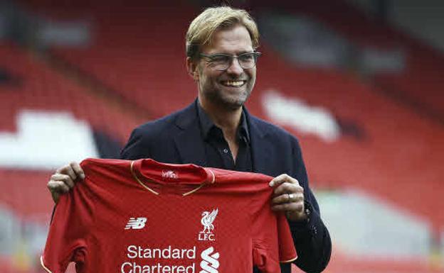 Imagen principal - Jürgen Klopp, cuatro años de &#039;rock and roll&#039; en el Liverpool