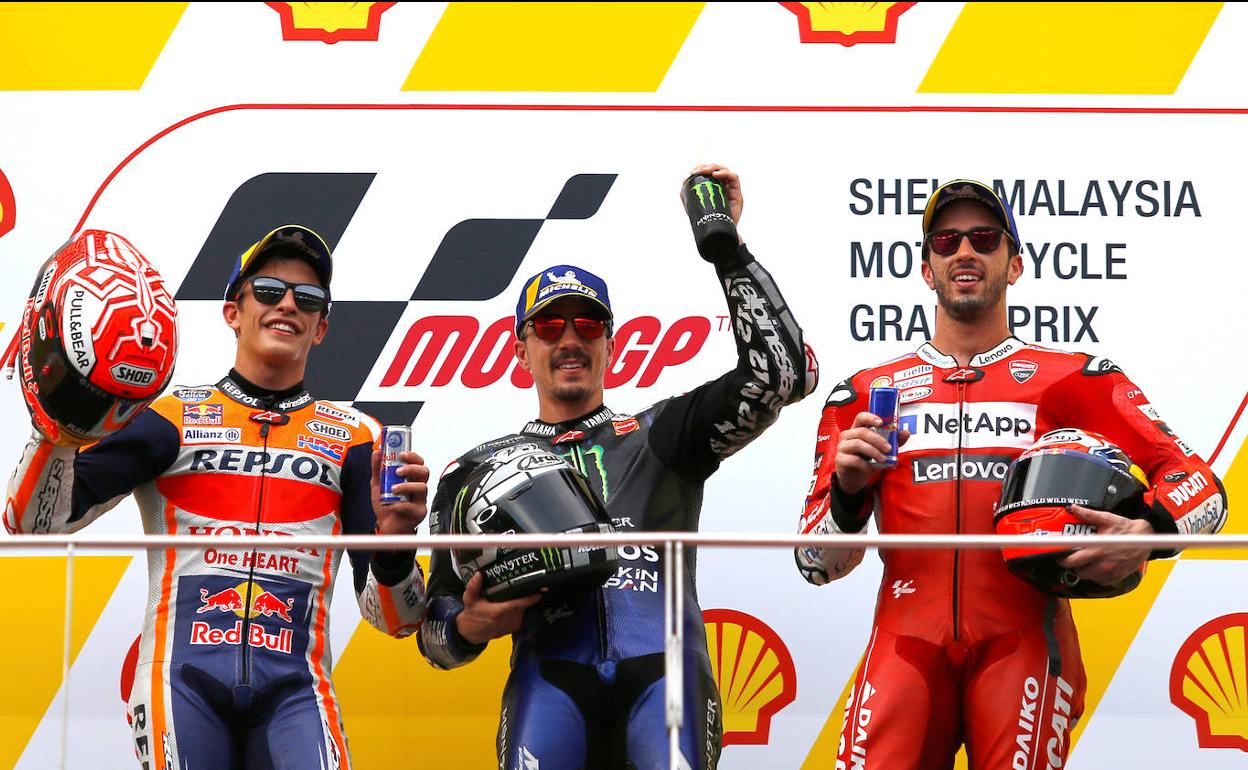 Marc Marquez (i), Maverick Vinales (c), y Andrea Dovizioso (d).