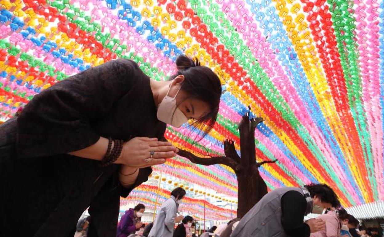 Mujeres con mascarilla en Corea del Sur 