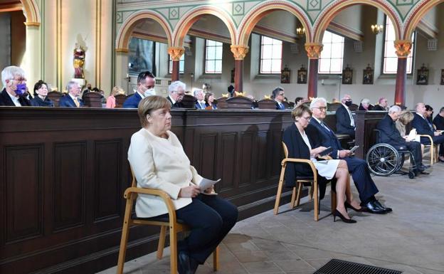 Angela Merkel y Frank Walter Steinmeier, en la ceremonia del día de la reunificación alemana 