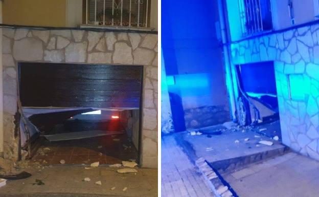 Así quedo el portón del garaje contra el que impactó el coche en el Paseo de los Pisones de Burgos