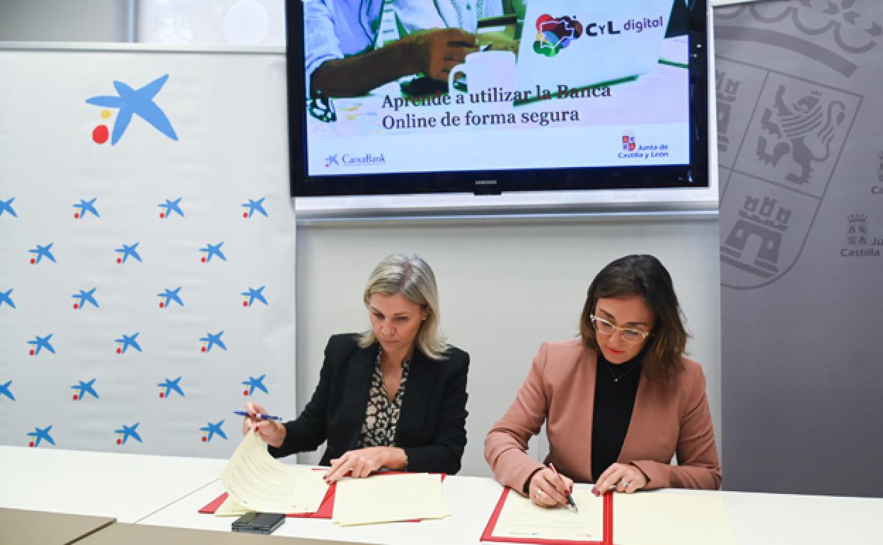 Belén Martín, directora territorial de CaixaBank en Castilla y León (izda.) y María González, consejera de Movilidad y Transformación Digital,, durante de la firma del acuerdo. 