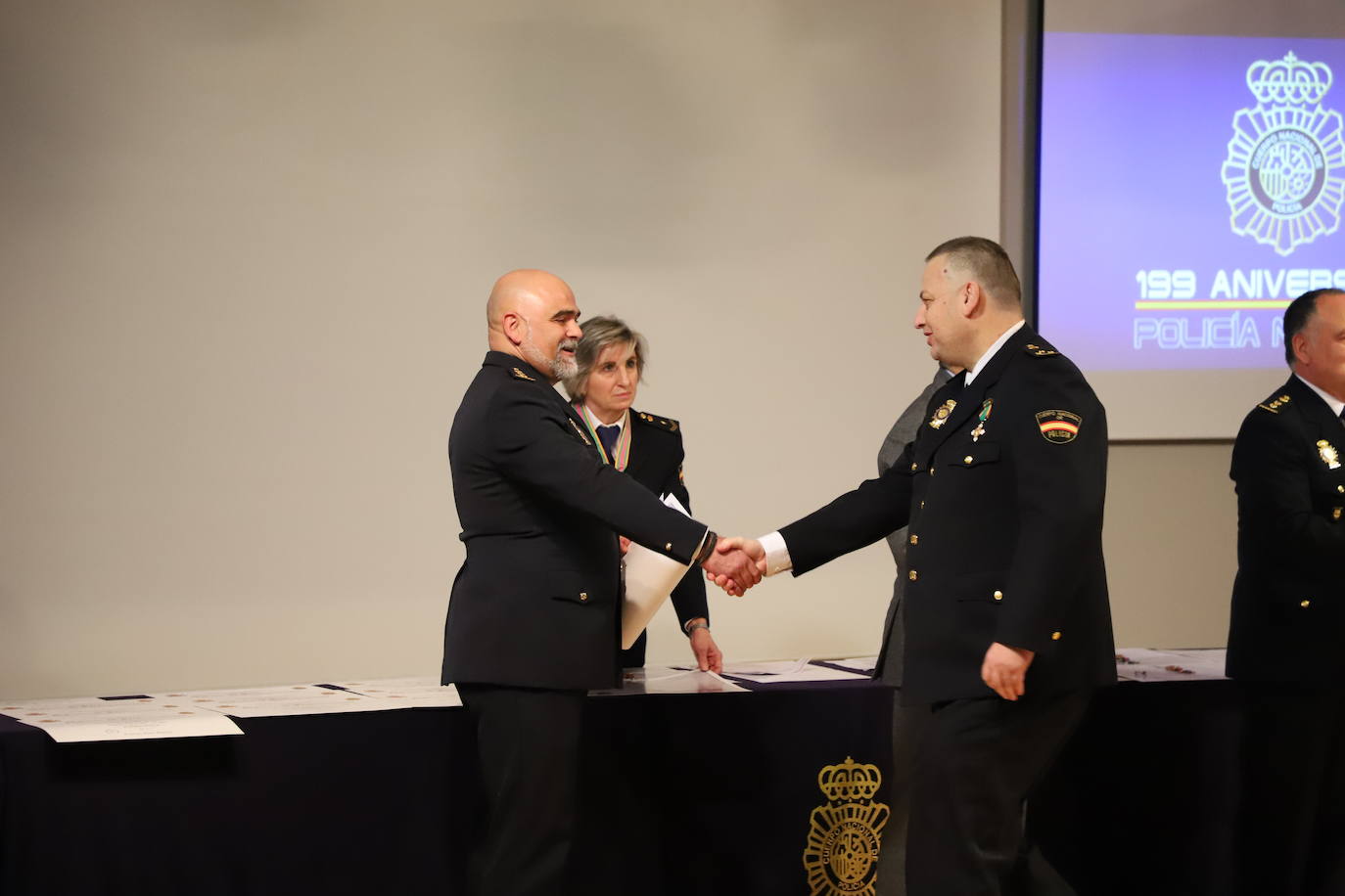 Acto del 199 aniversario del Cuerpo Nacional de Policial donde se ha reconocido a policías jubilados por sus servicios prestados y se ha condecorado a agentes con la medalla a la Dedicación al Servicio Policial