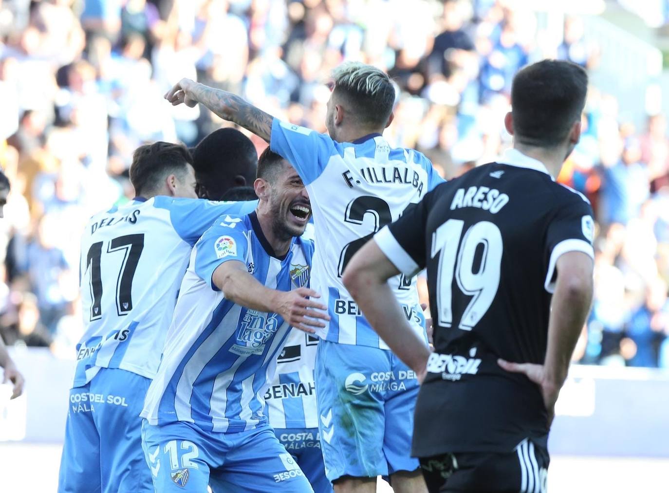 Imágenes del empate entre el Málaga CF y el Burgos CF disputado en La Rosaleda