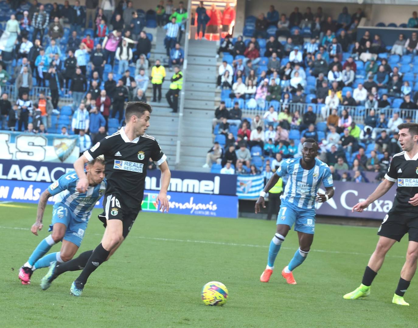 Imágenes del empate entre el Málaga CF y el Burgos CF disputado en La Rosaleda