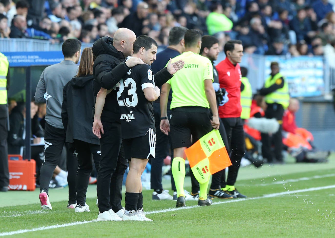 Imágenes del empate entre el Málaga CF y el Burgos CF disputado en La Rosaleda