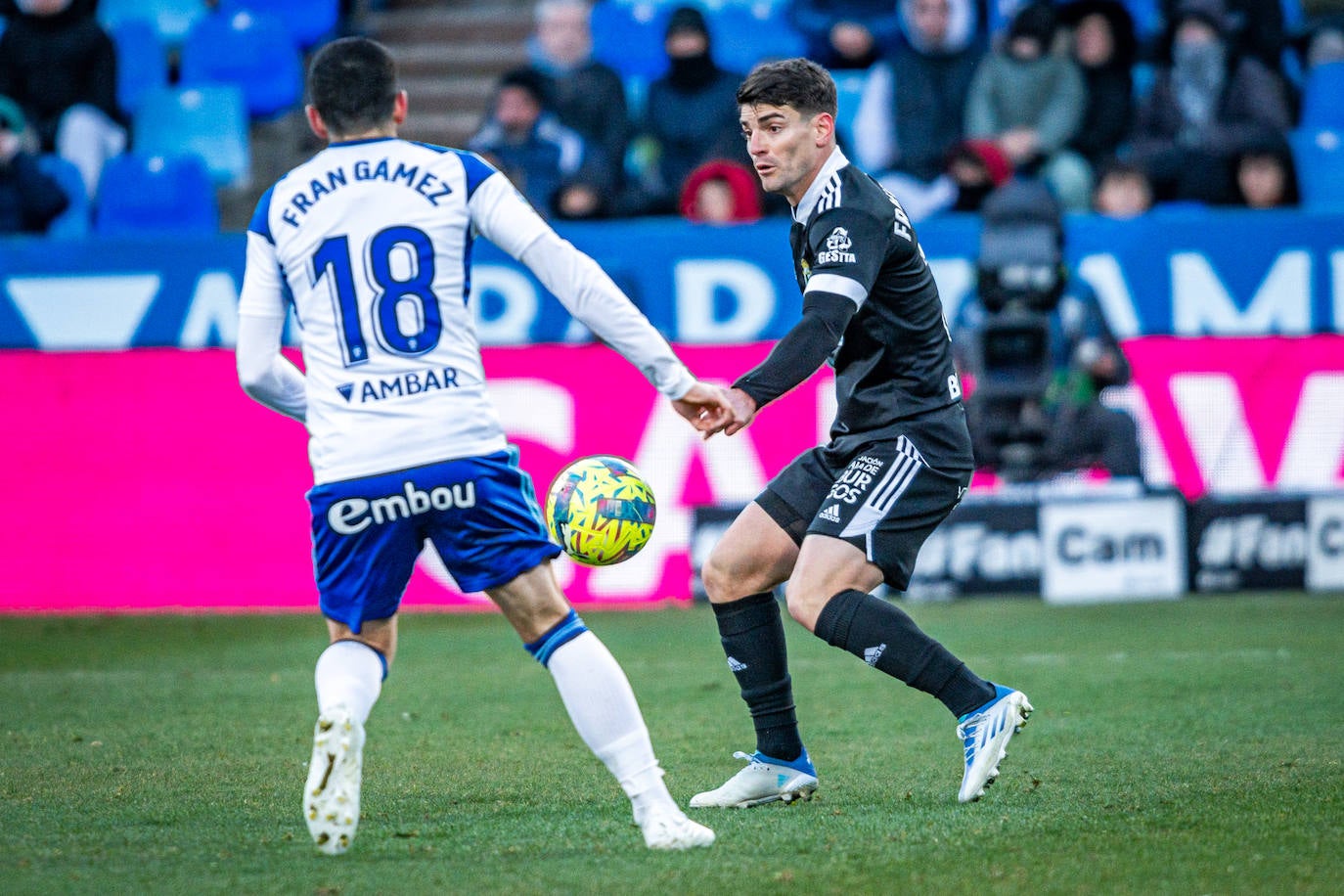 Fotos: El Burgos CF araña un punto en La Romareda