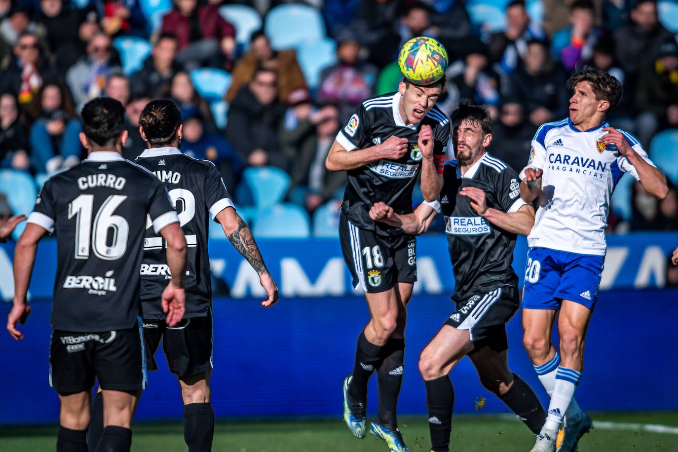 Fotos: El Burgos CF araña un punto en La Romareda