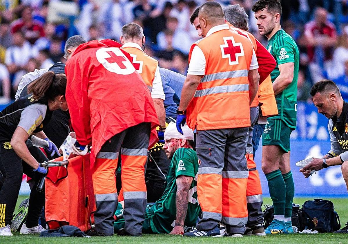 Imagen principal - Imágenes del accidente entre Mumo y Elgezabal.