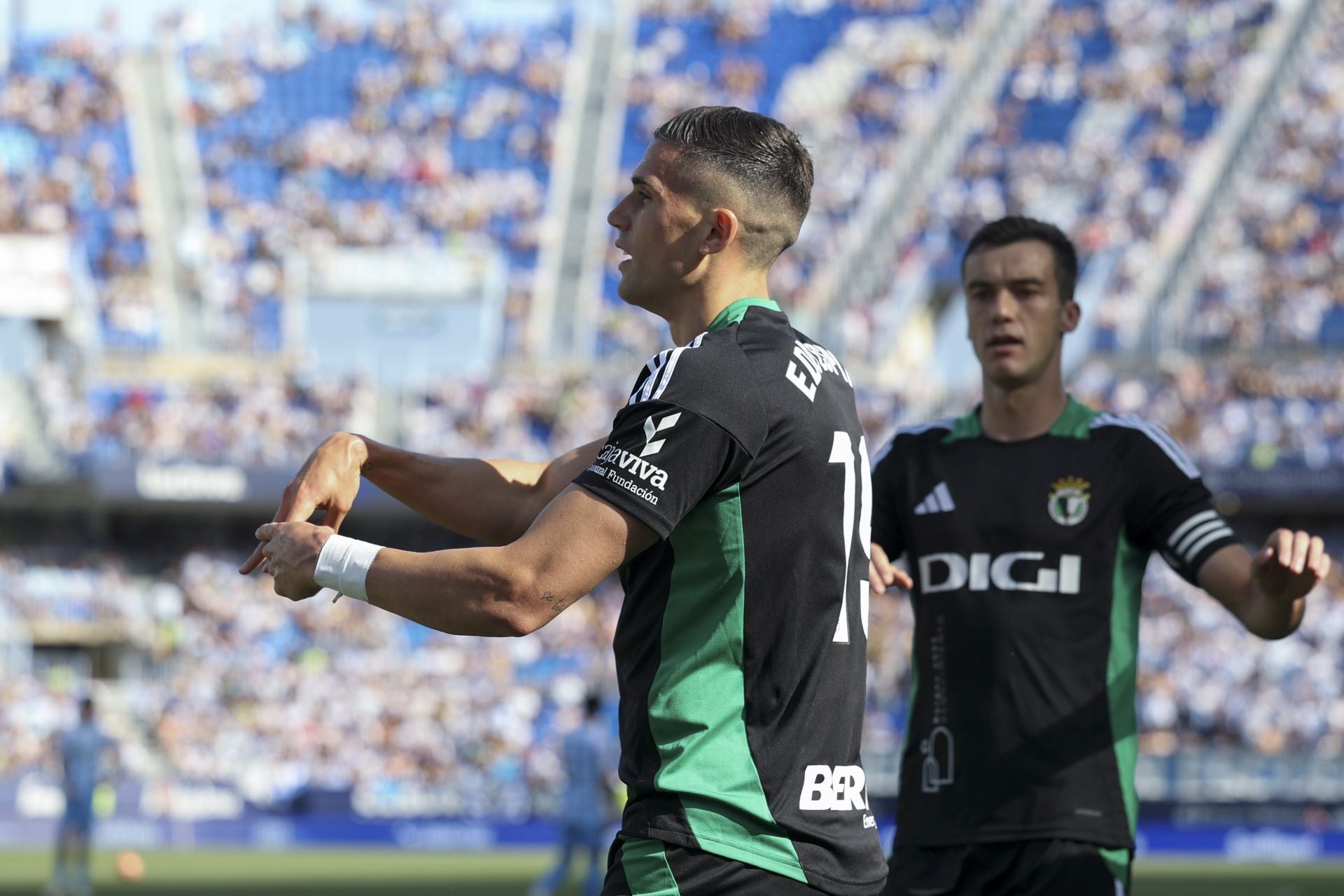 El encuentro del Málaga y del Burgos CF en La Rosaleda, en imágenes
