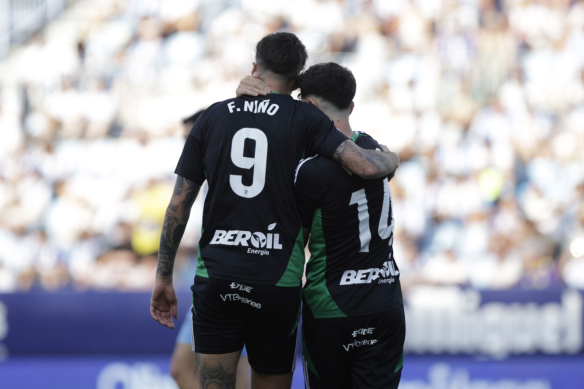 El encuentro del Málaga y del Burgos CF en La Rosaleda, en imágenes