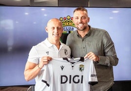 Mollejo, junto a Michu en su presentación oficial.