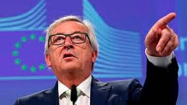 Juncker ofrece a May cambios en la "redacción" del marco futuro pero no en el acuerdo del Brexit