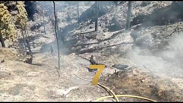 Primer respiro tras cuatro días en llamas