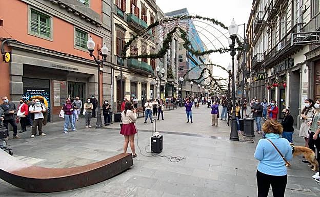Imágenes de la protesta este sábado en Triana. 