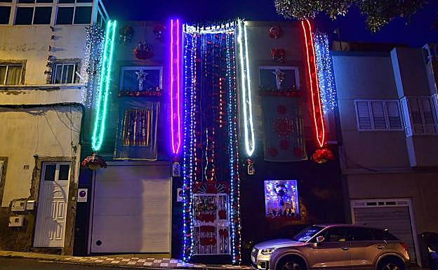 Imagen principal - Detalles de la fachada y del interior de la casa. 