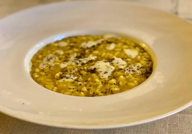 Risotto con calabaza, crema de queso y café de Il Raviolo