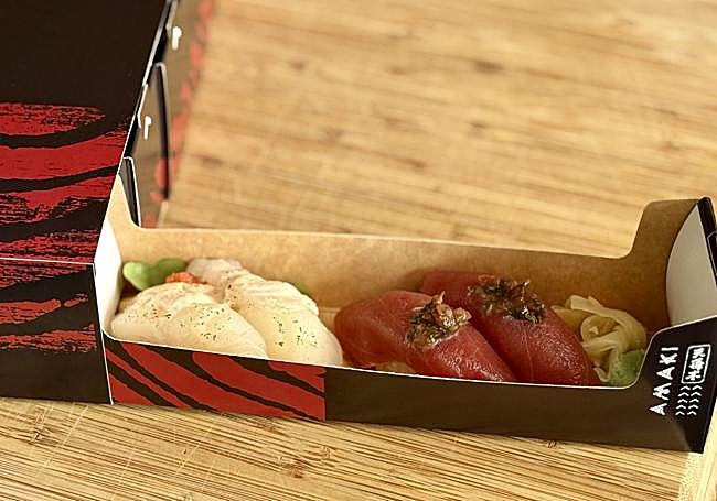 Niguiri de pez limón y de atún rojo en la caja Amaki Daniel Franco