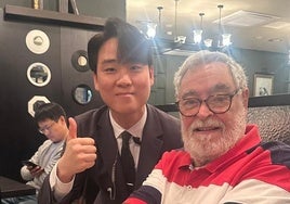 Con el manager Hy Oun Sue Lee del steakhouse Butcher's Cut