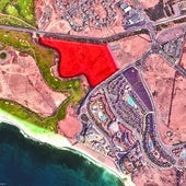 Vista aérea de Meloneras. La parcela que ha de pasar a rústica es la que aparece coloreada.