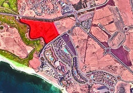 Vista aérea de Meloneras. La parcela que ha de pasar a rústica es la que aparece coloreada.