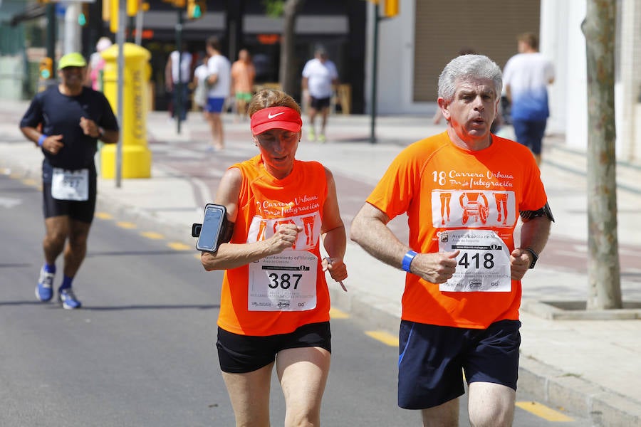 La 18 Carrera Urbana por la Integración en el Parque de Huelin, en imágenes
