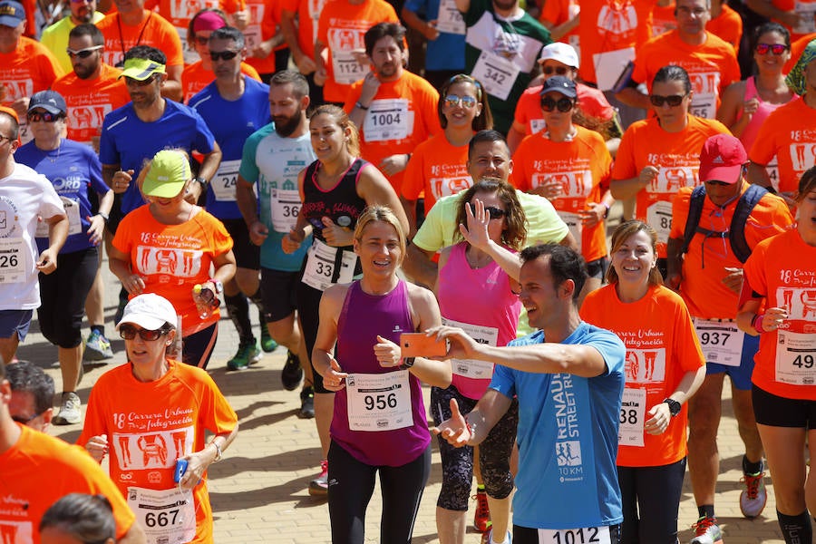 La 18 Carrera Urbana por la Integración en el Parque de Huelin, en imágenes