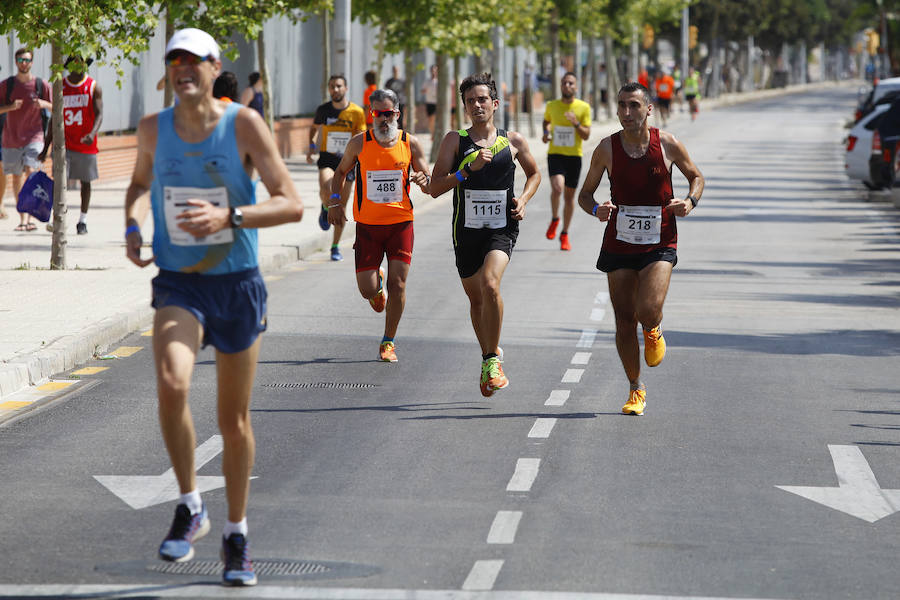 La 18 Carrera Urbana por la Integración en el Parque de Huelin, en imágenes