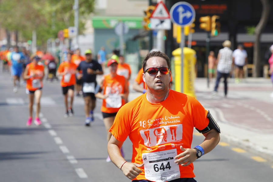 La 18 Carrera Urbana por la Integración en el Parque de Huelin, en imágenes