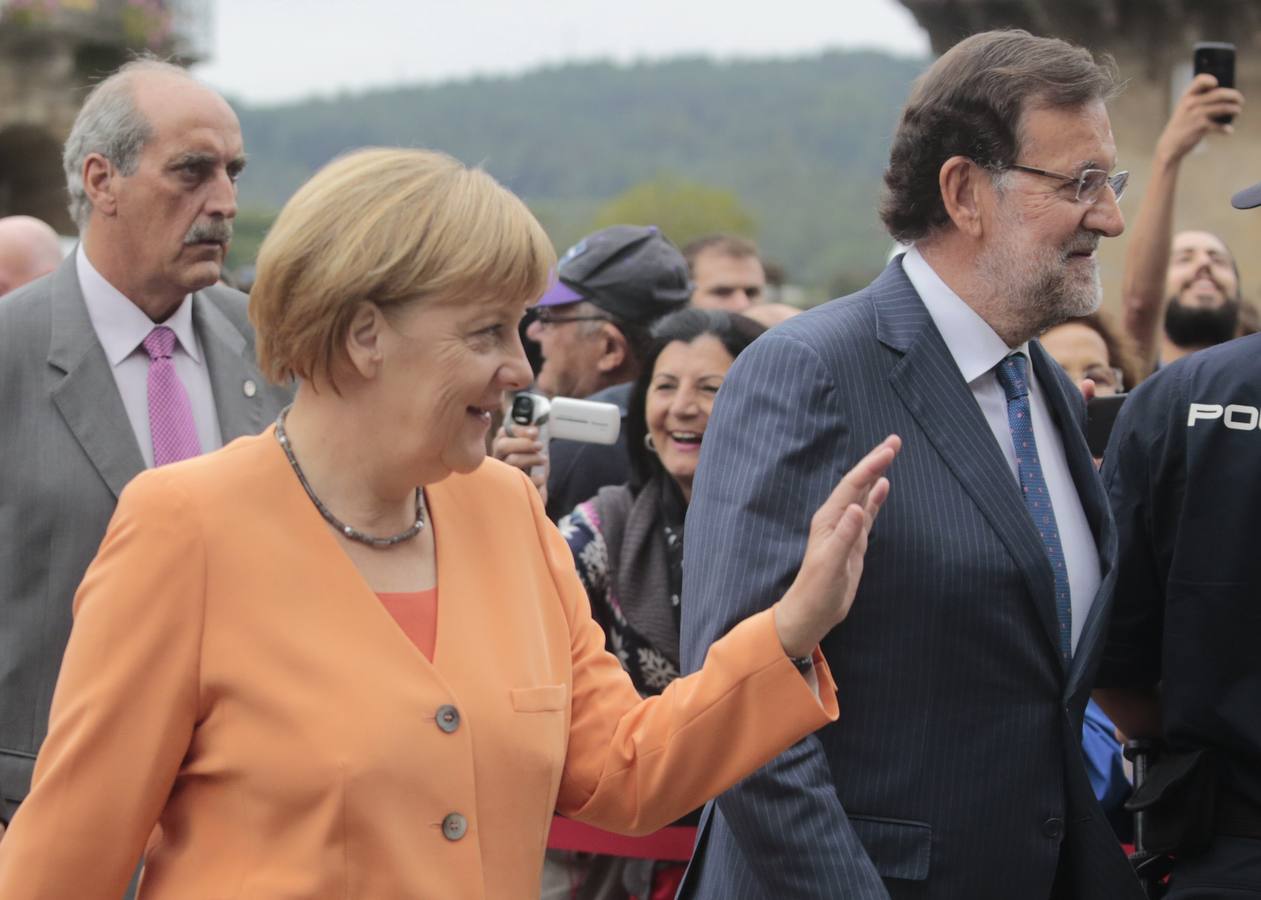 Merkel y Rajoy, dos peregrinos en Santiago