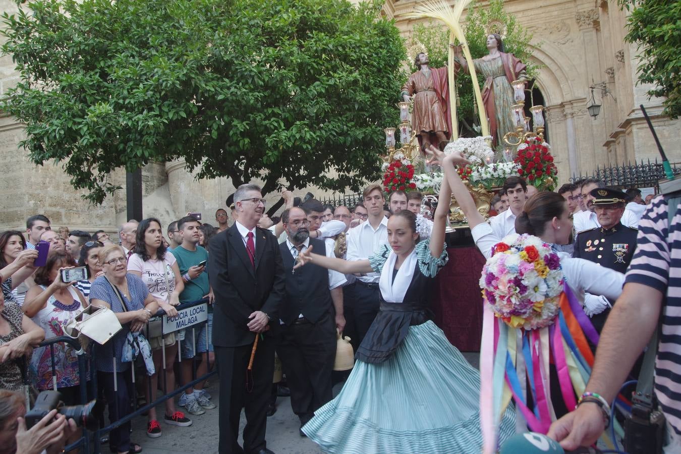 Los Santos Patronos de Málaga procesionan por el Centro