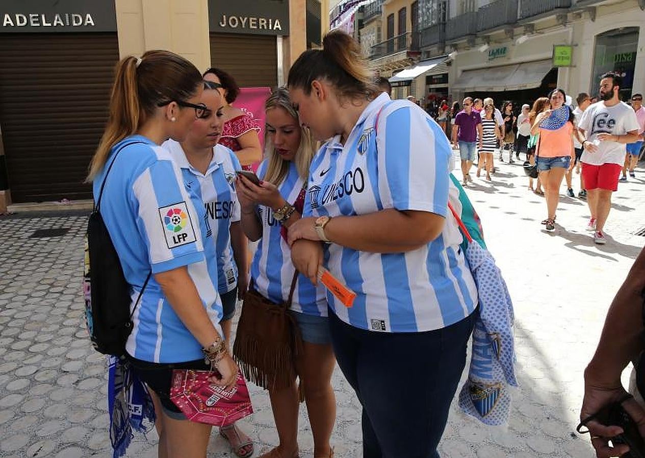 Ambiente del viernes de feria en el Centro de Málaga