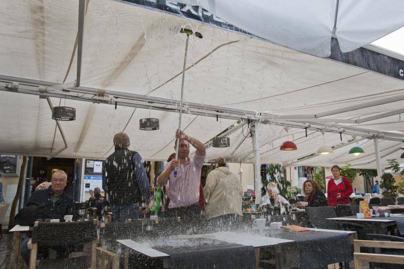 Fotos de las primeras lluvias del otoño en Málaga