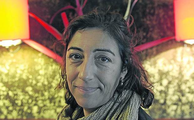 María Frisa. 