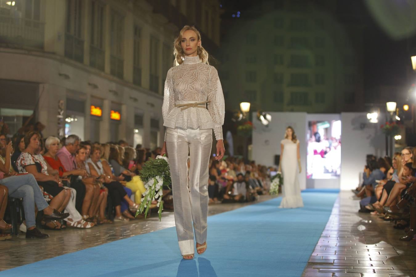 Málaga capital celebra su cita con la moda sobre la alfombra azul más larga de Europa