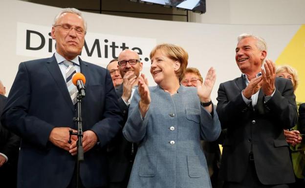 Angela Merkel celebra el resultado en Berlín.