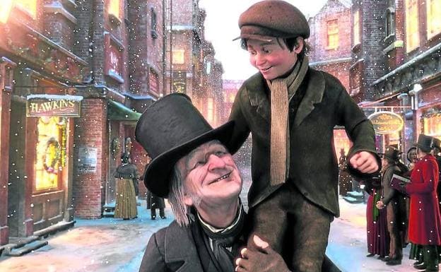 Un Scrooge reconciliado con la Navidad pasea en brazos al hijo tullido de su empleado, en la versión del célebre libro de Dickens (abajo) que Robert Zemeckis llevó al cine. 