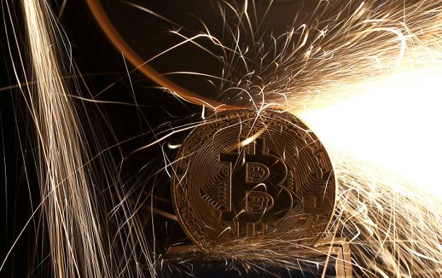 Recreación del 'bitcoin', la moneda virtual más popular. :: Dado Ruvic / reuters