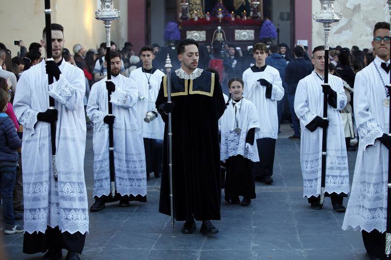 Estas son las mejores fotografías de la Cofradía de los Dolores del Puente durante su salida procesional en el Lunes Santo malagueño de 2018.