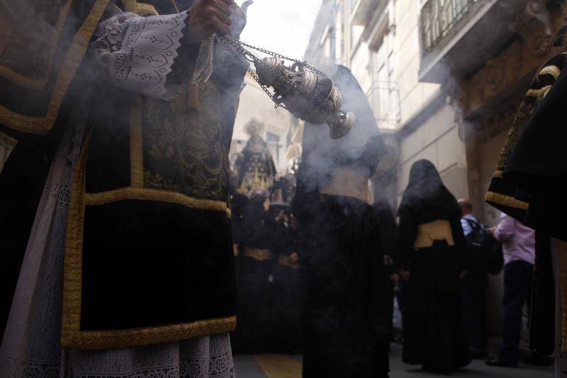 Las mejores imágenes de la Cofradía de Santa Cruz en el Jueves Santo 2018.