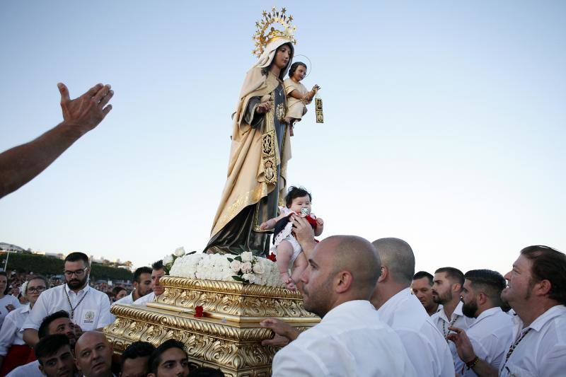 Celebración de la festividad y procesión en El Palo