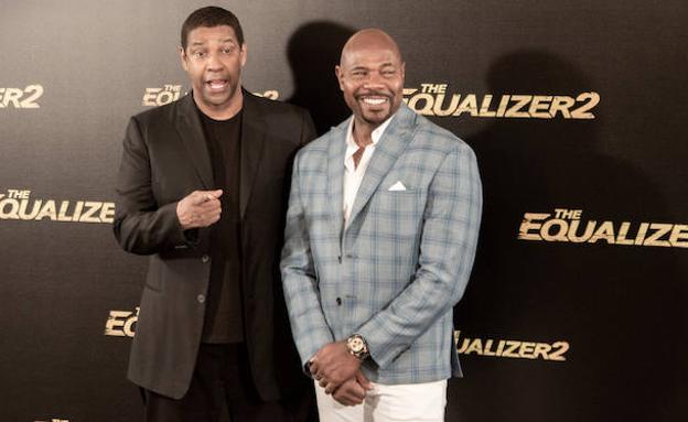 Denzel Washington y Antoine Fuqua, ayer, en Madrid. 