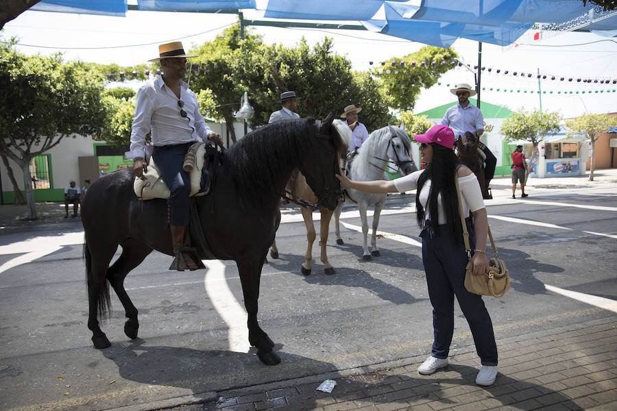 Fotos: Las mejores imágenes del primer domingo de la Feria de Málaga 2018