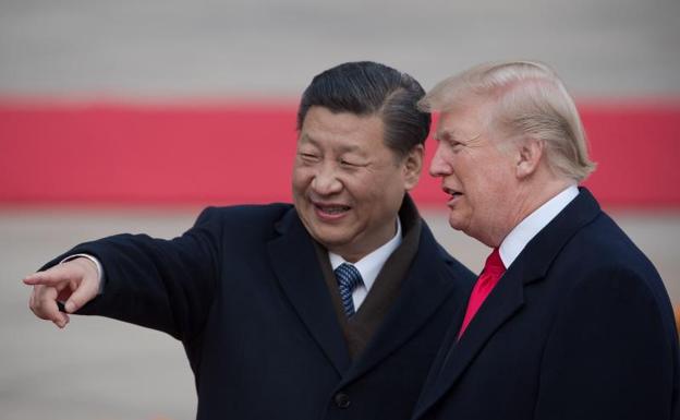 Los presidentes Xi Jinping y Donald Trump. 