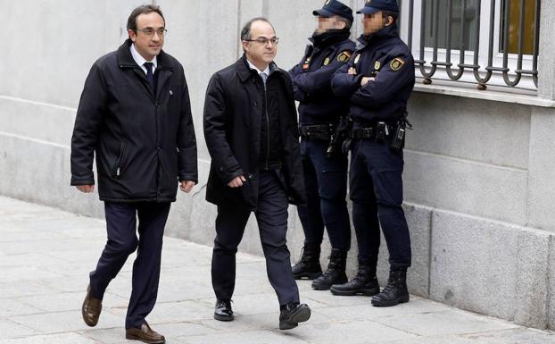 Jordi Turull (d) y Josep Rull (i) a su llegada al Tribunal Supremo en mayo de 2018.