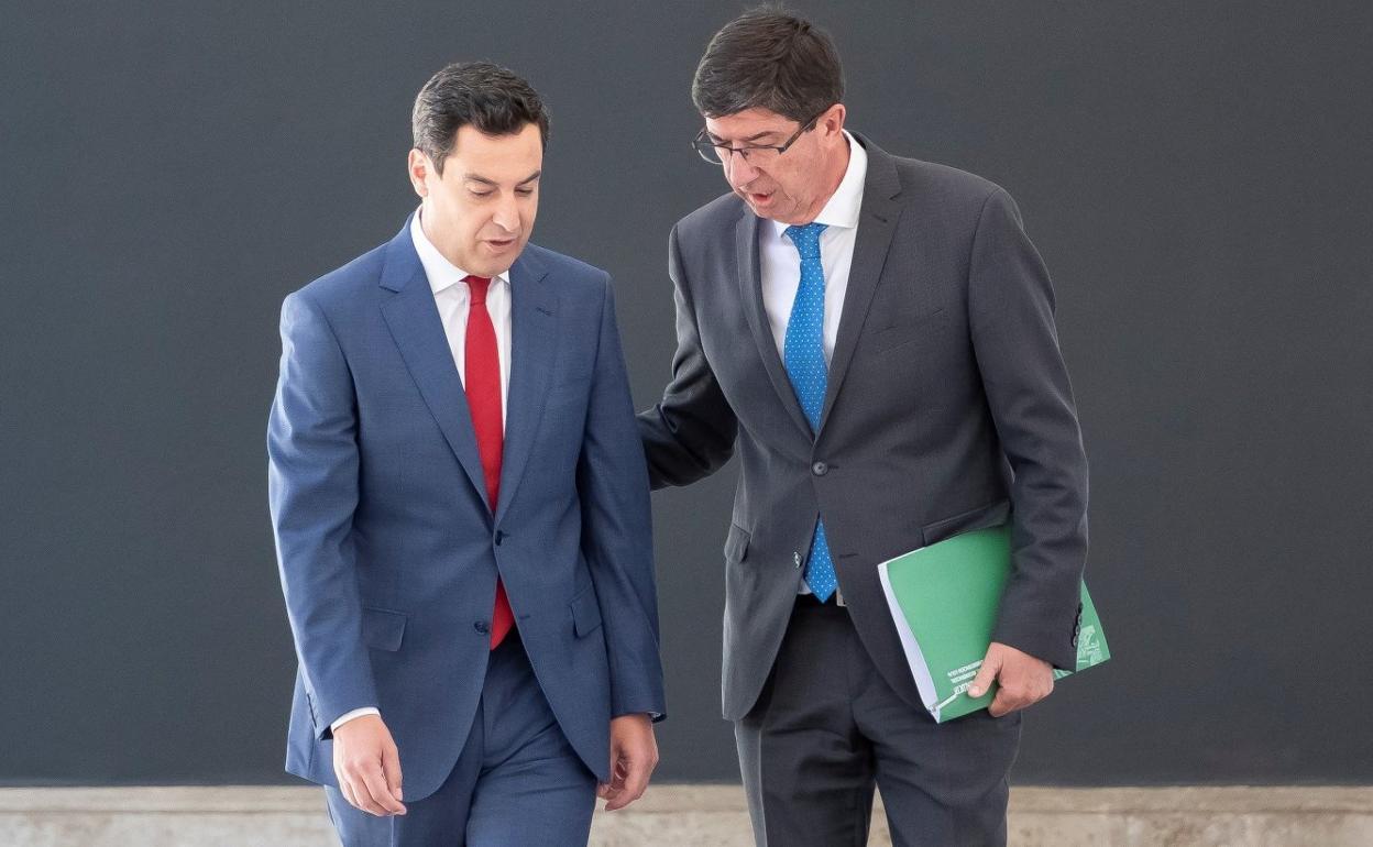 El presidente del Gobierno, Juanma Moreno, y el vicepresidente, Juan Marín. 