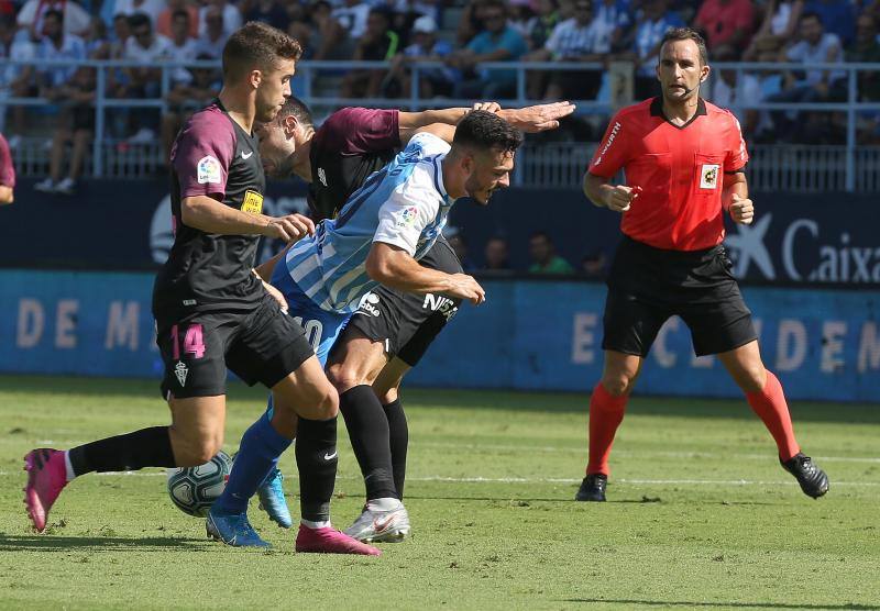 El partido en la Rosaleda entre el Málaga y el Sporting, en fotos